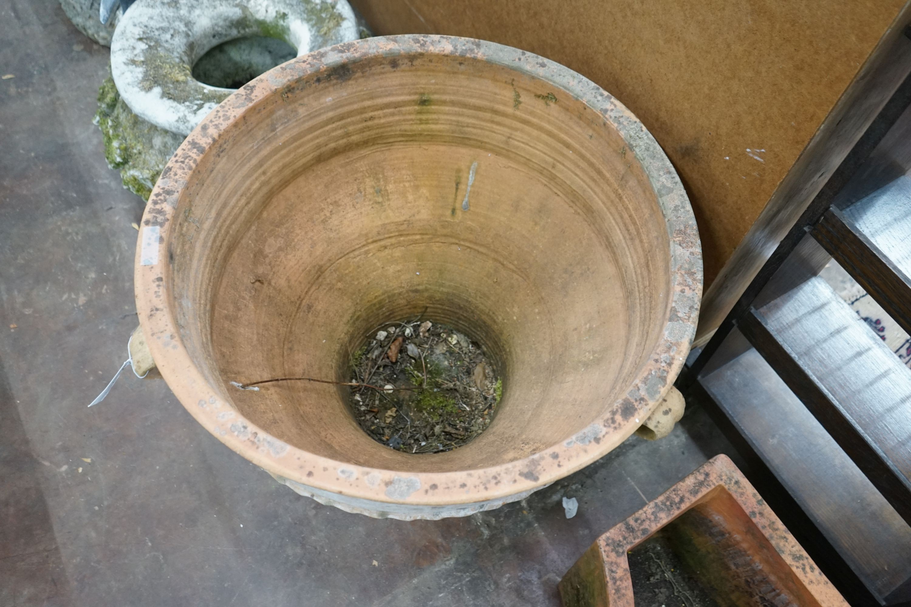 A large Greek style circular terracotta garden planter, diameter 72cm, height 59cm